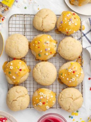 yellow frosted sugar cookies with sprinkles yellow frosted sugar cookies with sprinkles